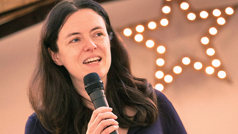 Anne Dannerolle speaking in church