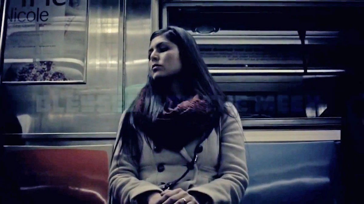 Young woman dozing on a train