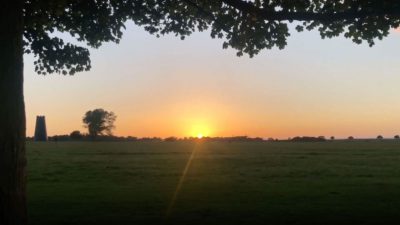 Sunrise over a distant horizon
